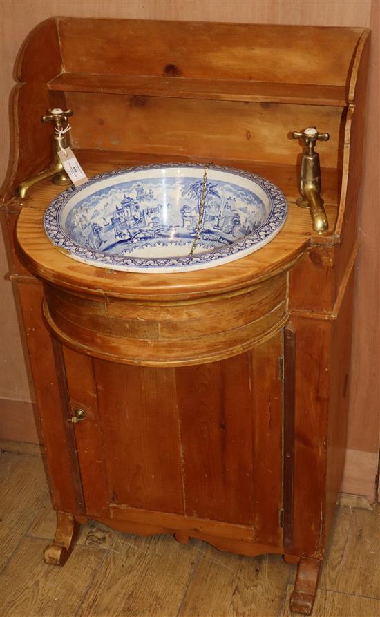 A 19th century pine washstand with blue and white panorama basin H.106cm